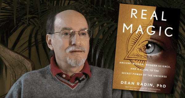 Dr. Dean Radin with his book, Real Magic, Credit: Dr. Dean Radin