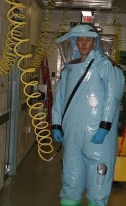 Dr. Kortepeter in the BSL-4 lab, photo credit: Gene Olinger